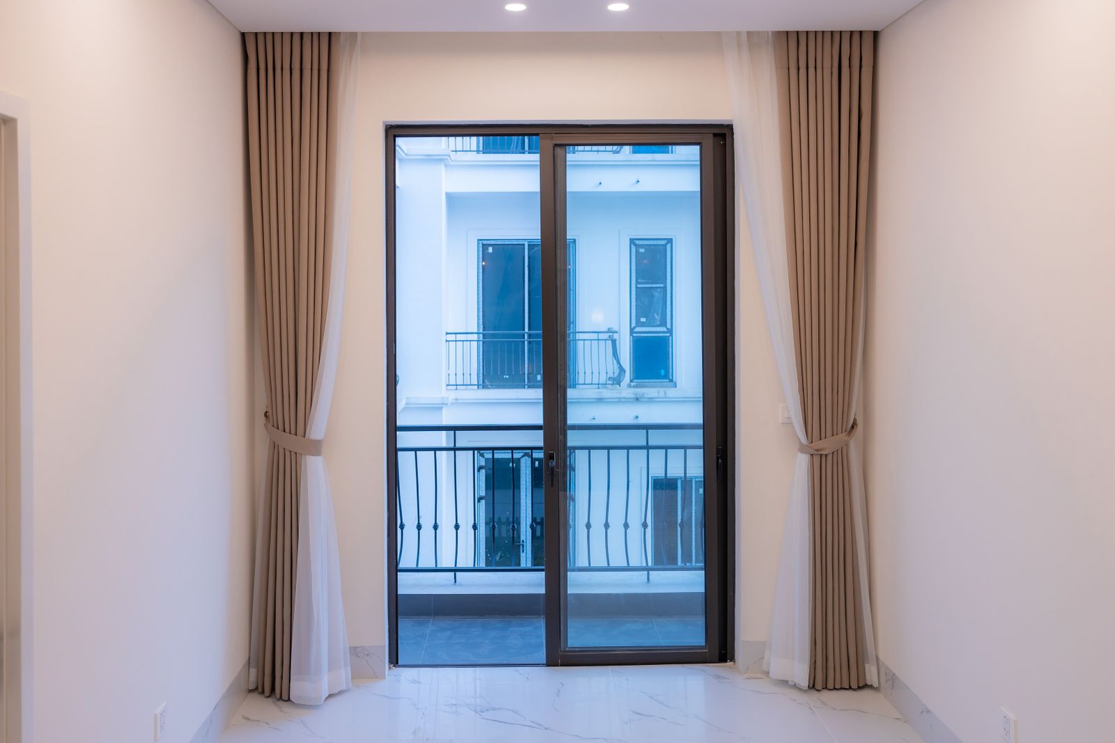 Bright modern room with a large sliding glass door